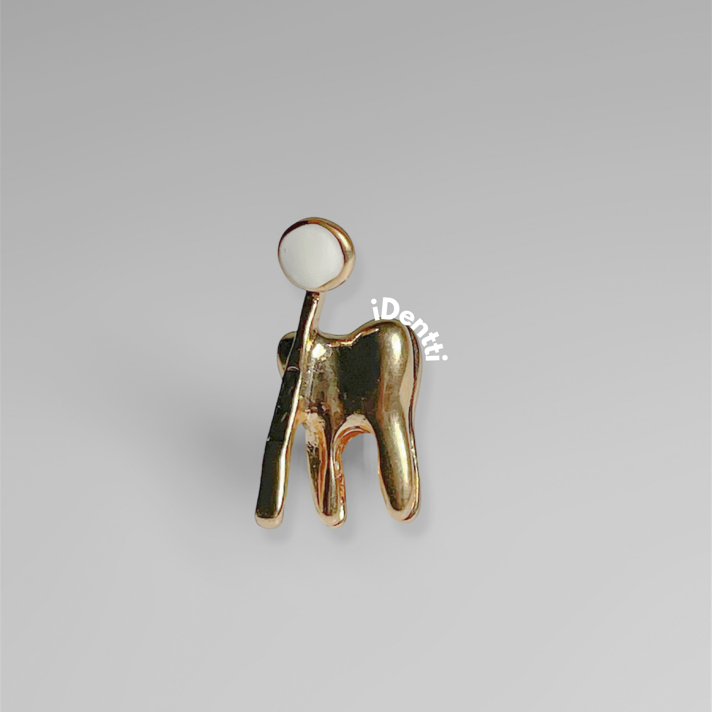 Pin muela dorado